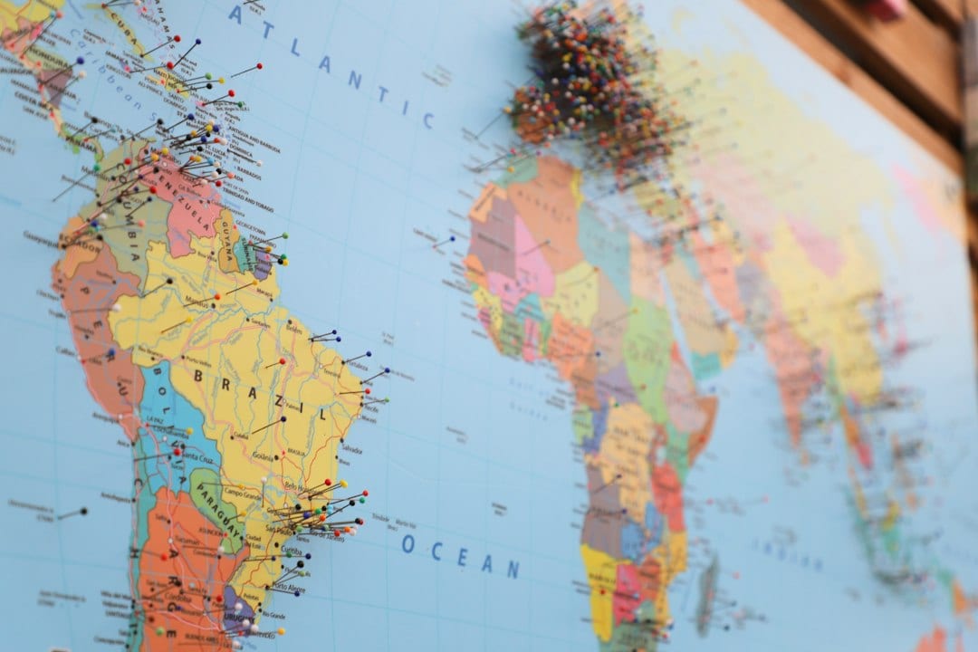 Stylized world map showing CHOHELP's global shipping network and trade routes